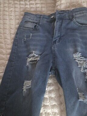 Distressed Blue Denim Jeans Size Medium No Tags Stating Medium.  Stretch.
